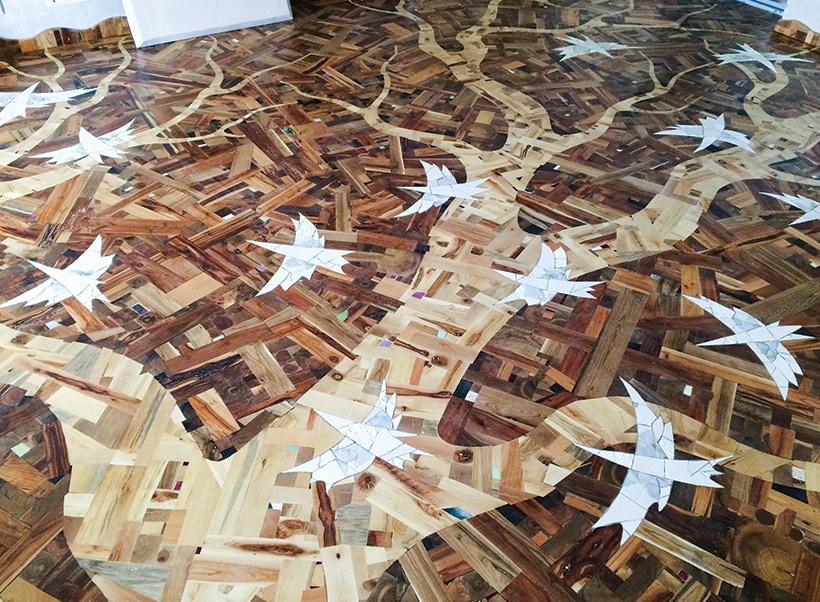 Russian Designer Uses Scrap Wood For Floor That Climbs Walls